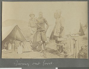 Handing out rations, Ancuabe, Mozambique, March-April 1918