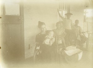 Mrs Robert under the veranda of her house, in Lambarene, Gabon