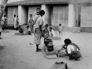 East Jeypore, Orissa, India. From the Gunupur Widows Home Sarepta. Women are preparing food out