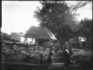 African women threshing beans, Antioka, Mozambique, July 1923