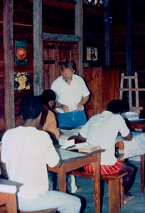 Missionary Sven Erik Simonsen in the classroom with students at the Sambava Bible School, Madag