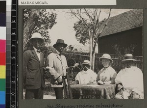 Missionary's wife receiving subscriptions, Madagascar, ca.1910-1920