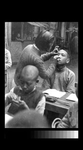 Examining for trachoma, Chengdu, Sichuan, China, ca.1942