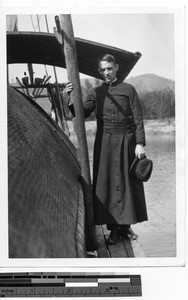 Fr. Eckstein on a boat in Meixien, China, 1936