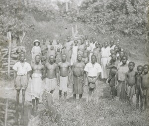 Onlookers at baptism in river, Congo, ca. 1920-1930