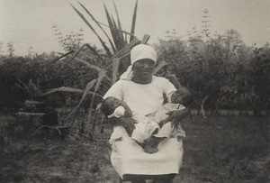 Nurse Alim and babies, Nigeria, ca. 1933