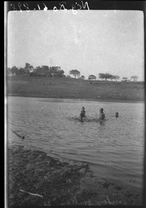 African children bathing in a little lake, Catembe, Mozambique