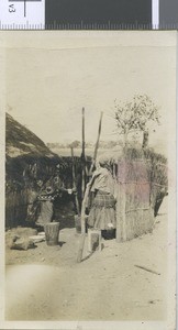 Women grinding meal