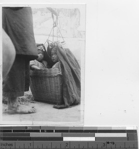 Two babies in a basket at Stanley, Hong Kong, China, 1939