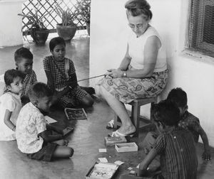 East Jeypore, India, Missionary Kæthe Andersen teaching at the porch, Gunupur. Used in: Dansk M