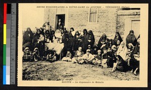 People gathered outside a mission dispensary, Egypt, ca.1920-1940