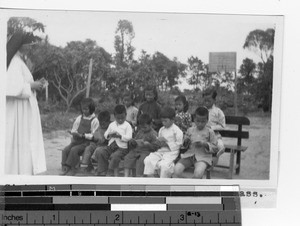 Maryknoll Sister with catechism class at Yangjiang, China, 1949