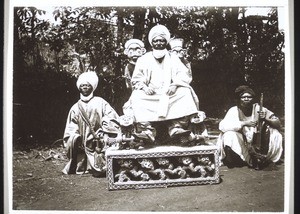 King Njoya with two attendants in Fumban