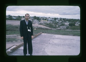 Man standing in a building under construction