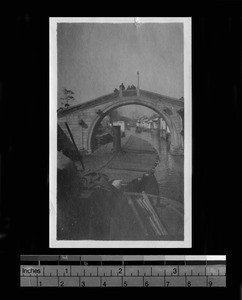 Canal with boats and bridge, between Suzhou and Zangzok, China, ca.1922