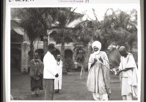 King Njoya in front of his palace in Fumban on the day before he was taken into exile in 1931