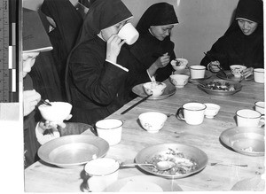 Immaculate Heart Sisters eating dinner, Jiangmen, China, ca. 1947