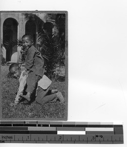 Two boys playing at Dongzhen, China, 1927