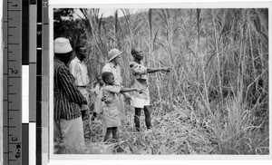 Group of people in the bush, Musoma, Tanzania, Africa, 1949