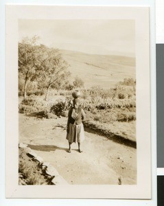 Zulu woman carrying a pot on her head, South Africa