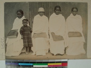 Blind men and women holding braille books, Alakamisy, Madagascar, ca.1912