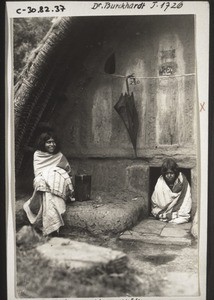 Todas in front of their hut