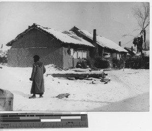 Snow covered houses at Fushun, China, 1938