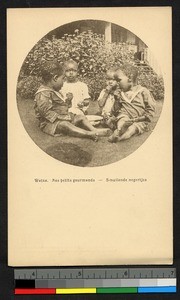 Four small children eating outdoors, Congo, ca.1920-1940