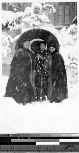 Mother Mary Joseph Rogers and Sr. Genevieve Beez standing in the snow with a Japanese woman, Japan, 1927