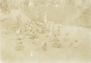 Children shelling the coffee beans, in Gabon