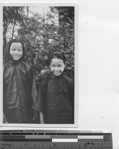 Two orphan girls at Luojing, China, 1934