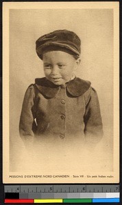 Young boy wearing buttoned coat and hat, Canada, ca.1920-1940