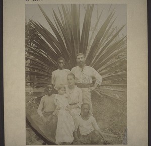 Christaller, Head of the Government School, with his wife and child, houseboys, and a subordinate teacher