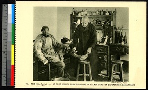 Missionary doctor treats patient, China, ca.1920-1940