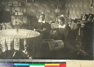 Deaconess Sina Loeken and deaconess Anna Ammundsen in their living room, Mangarano, Madagascar, ca.1920