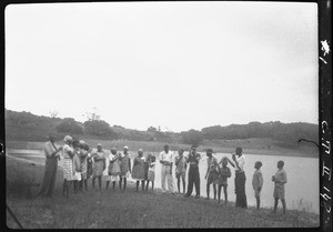 African boys and girls performing a show, Nwapulane, Mozambique, 1933