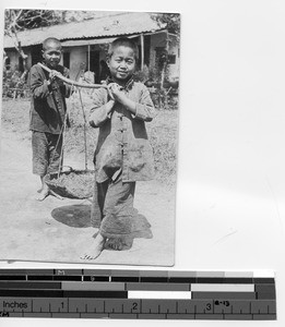 Two boys working at Dongzhen, China, 1930