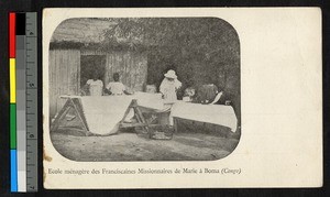 Students learning how to iron, Boma, Congo, ca.1920-1940