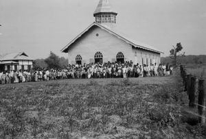 Gindaguri Church with the congregation assembled outside, Assam, North India