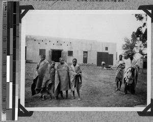 Four boys in sheepskin rugs, South Africa East