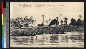 People paddling boats down a river, Congo, ca.1920-1940