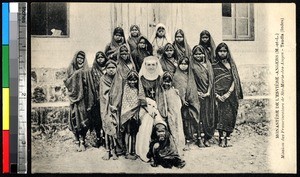 Girls and young women with a missionary nun, India, ca.1920-1940