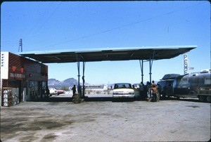 Vehicles at filling station