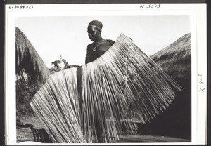 A mat made of palm leaves for a roof or a wall