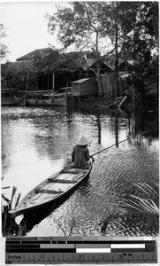 Man fishing in a river, Japan, ca. 1920-1940