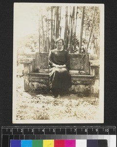 Doctor's wife in garden of Mission doctor's house at Yongchun, China, ca. 1922-1931