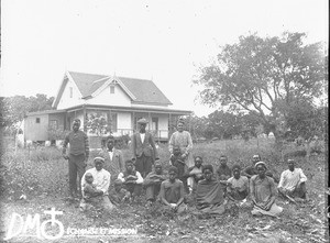 Group of people in front of the mission house, Khovo, Maputo, Mozambique, ca. 1896-1911