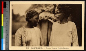 Two young women conversing outdoors, Madagascar, ca.1920-1940