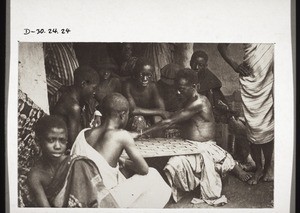 Africans playing a board-game