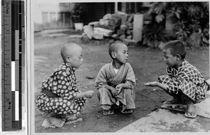 Three boys playing stone, shears, wood, Japan, ca. 1932